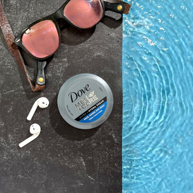 Dove Men+Care jar in travel pouch highlighting TSA-friendly portability