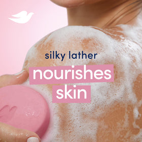 Dove label and ingredient stamp highlighting pH-balanced formula and mild-care benefit
