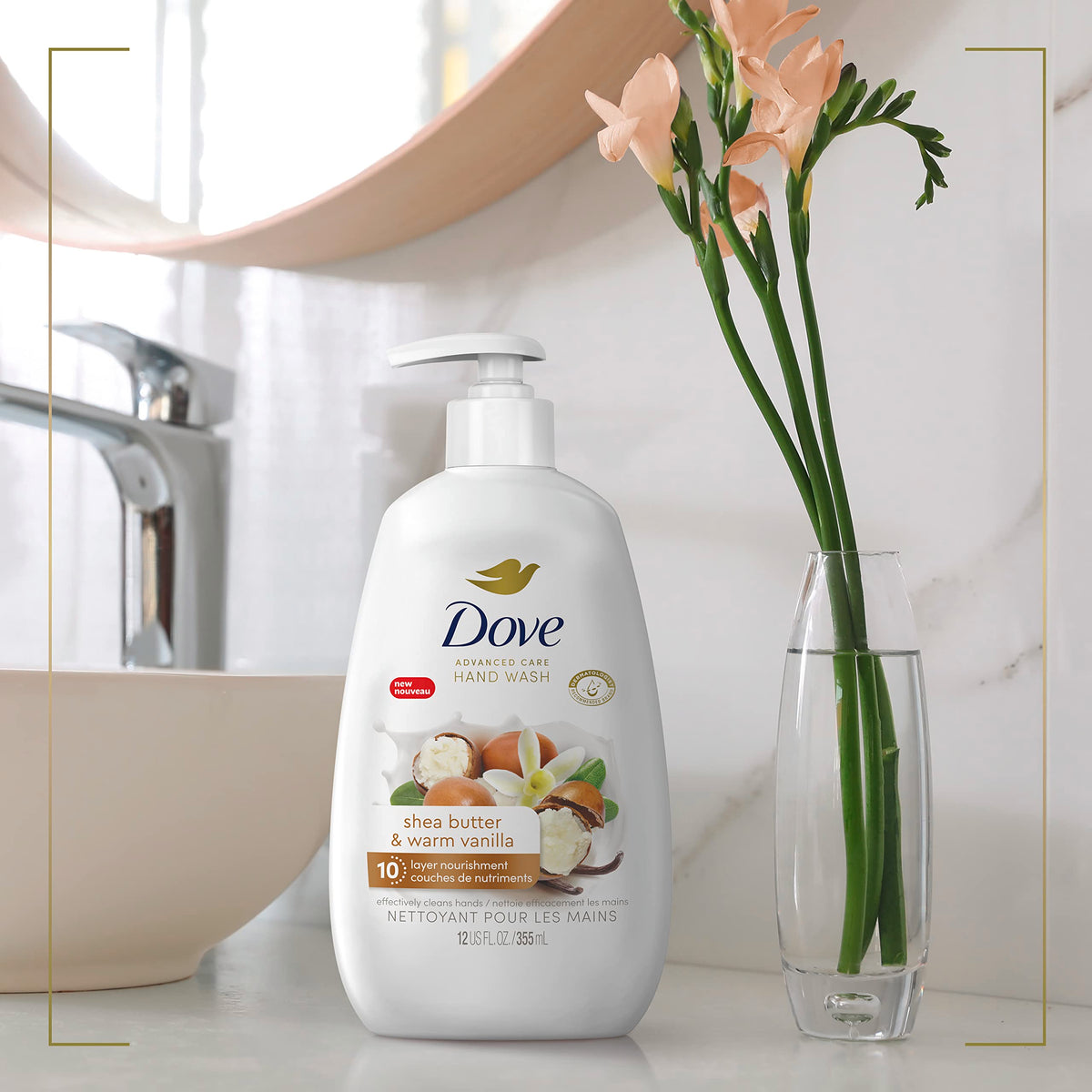 Dove hand wash in bathroom lifestyle setting showing product use and smooth, moisturized hands