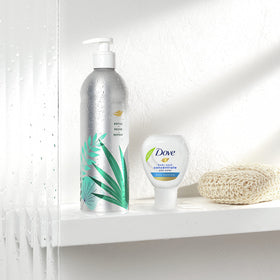 Dove concentrate beside full-size bottle to show volume comparison