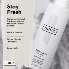 dpHUE bottle held in hand showing 8.5 oz size for scale