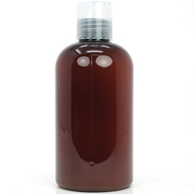 Dr Adorable spatula scooping oil emphasizing hygienic application benefit