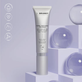 Dr. Brandt primer applied by mirror in lifestyle setting highlighting daily routine use