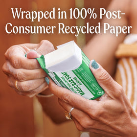 Dr. Bronner's almond bar recycled paper wrapper detail promoting eco packaging