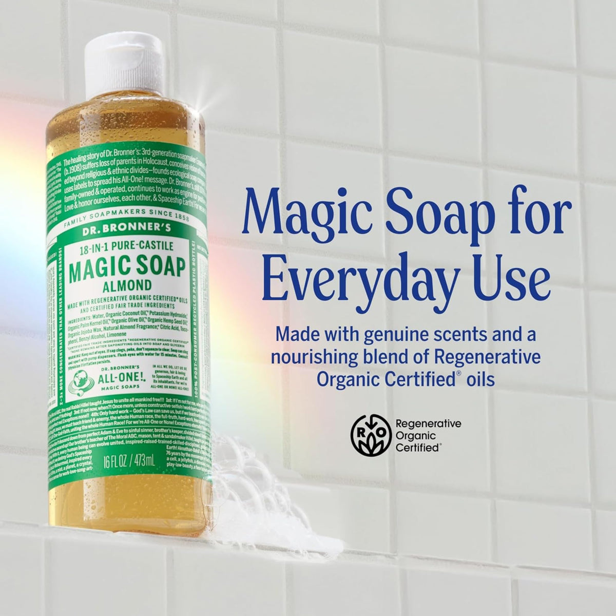 Dr. Bronner's almond soap pumped into hand creating rich foam for gentle cleansing