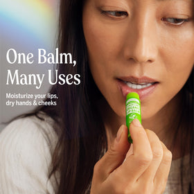 Dr. Bronner's applying peppermint to lips for refreshing soothing protection