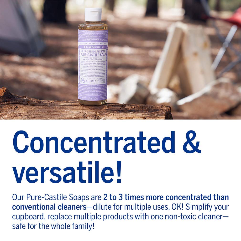 Dr. Bronner's bottle held in hand showing 8 oz size for travel-friendly use