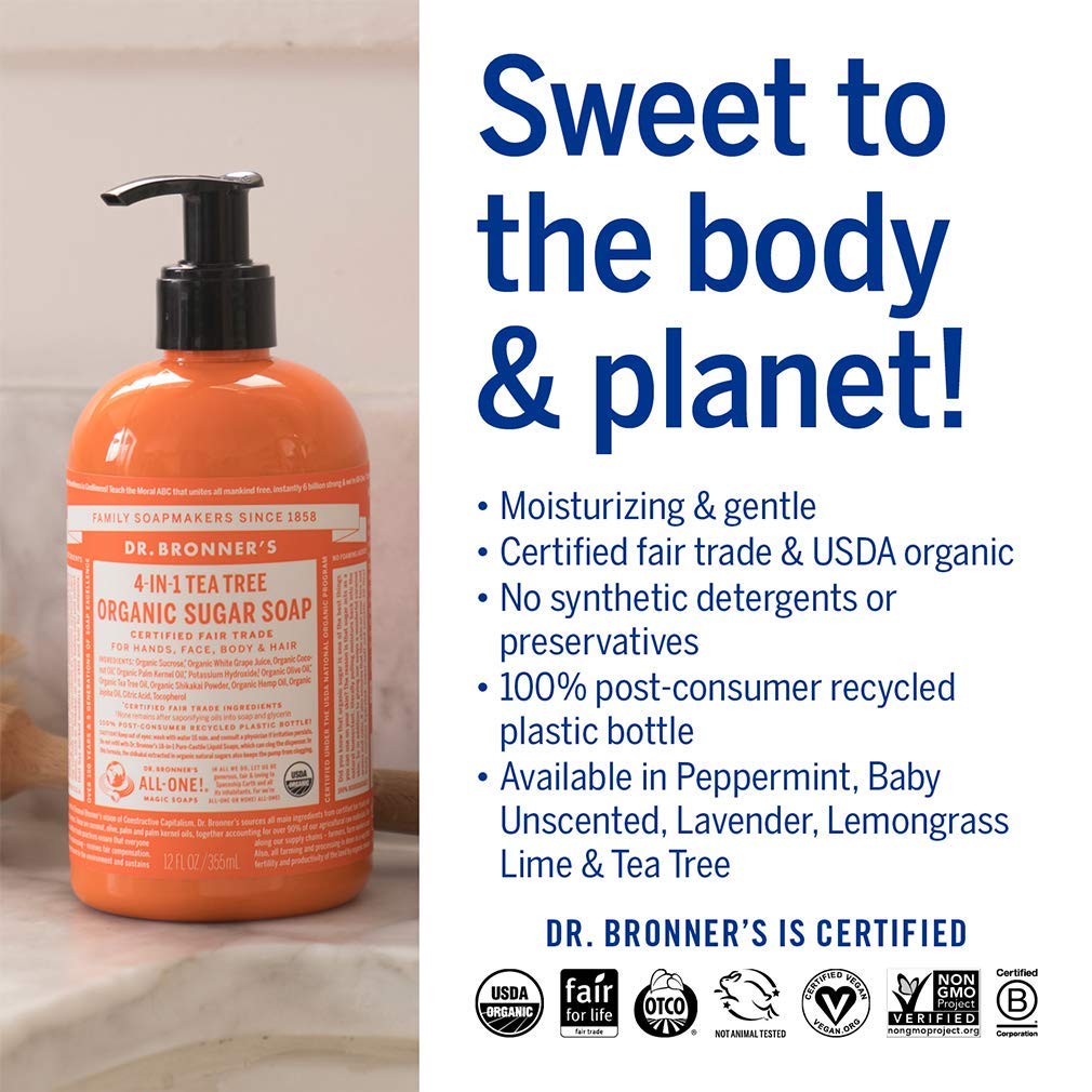 Dr. Bronner's bottles in hand for scale showing travel-ready convenience and size