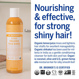 Dr. Bronner's hair in use showing detangled shiny mid-lengths