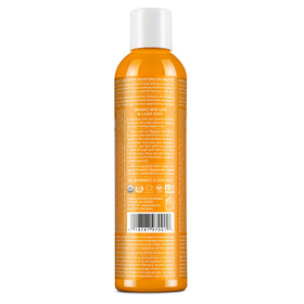 Dr. Bronner's pour close-up demonstrating lightweight creamy rinse