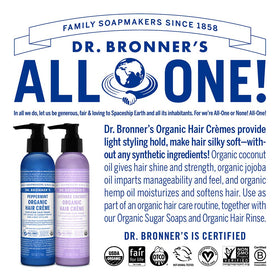 Dr. Bronner's ingredient display with jojoba and hemp bottles emphasizing organic oil nourishment benefit
