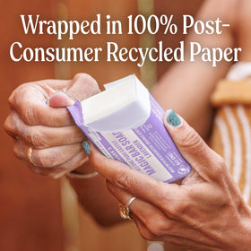 Dr. Bronner's post-consumer recycled paper wrapper emphasizing eco packaging