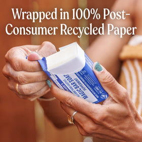 Dr. Bronner's bar in shower setting conveying refreshing and energizing wash