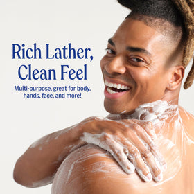 Dr. Bronner's concentrate dilution demo showing measured soap mixed with water