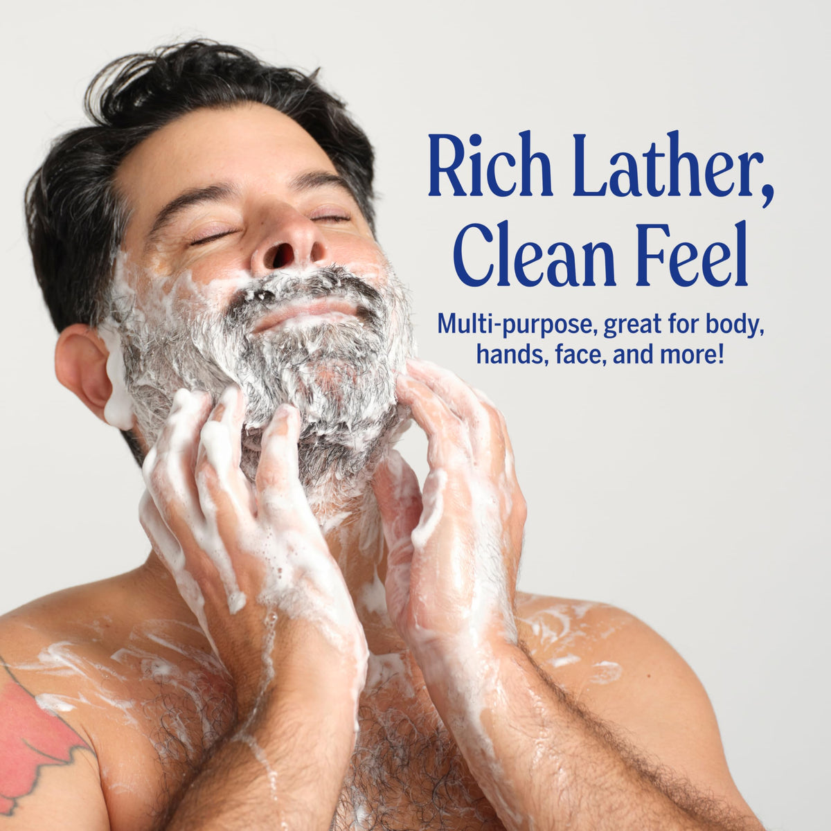 Dr. Bronner's Tea Tree foam on palm showing rich lather and cleansing benefit
