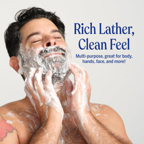 Dr. Bronner's Tea Tree foam on palm showing rich lather and cleansing benefit