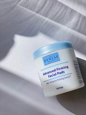 Dr. Denese close-up of pad texture showing saturated wipe for effective exfoliation