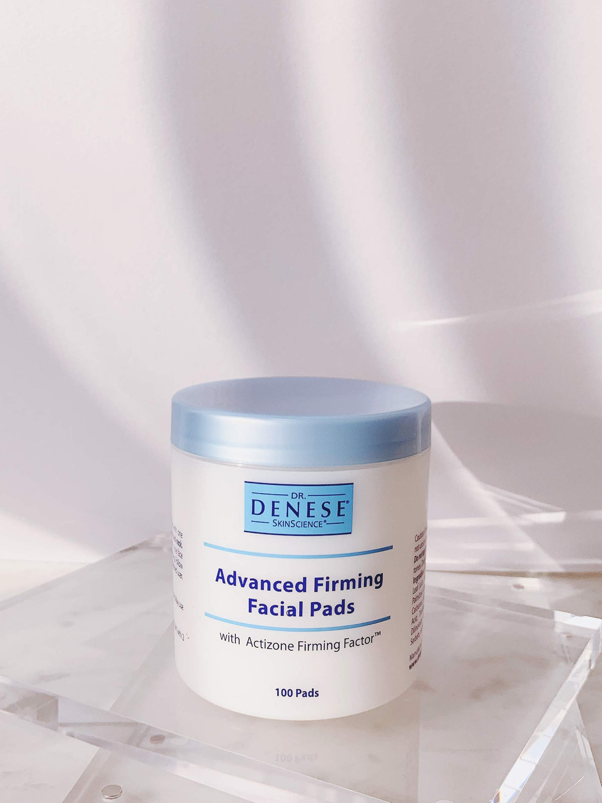 Dr. Denese pad on fingertip illustrating easy single-hand application and control