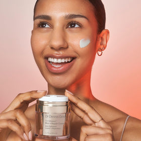 Dr Dennis Gross in a clean bathroom routine, conveys everyday skincare integration