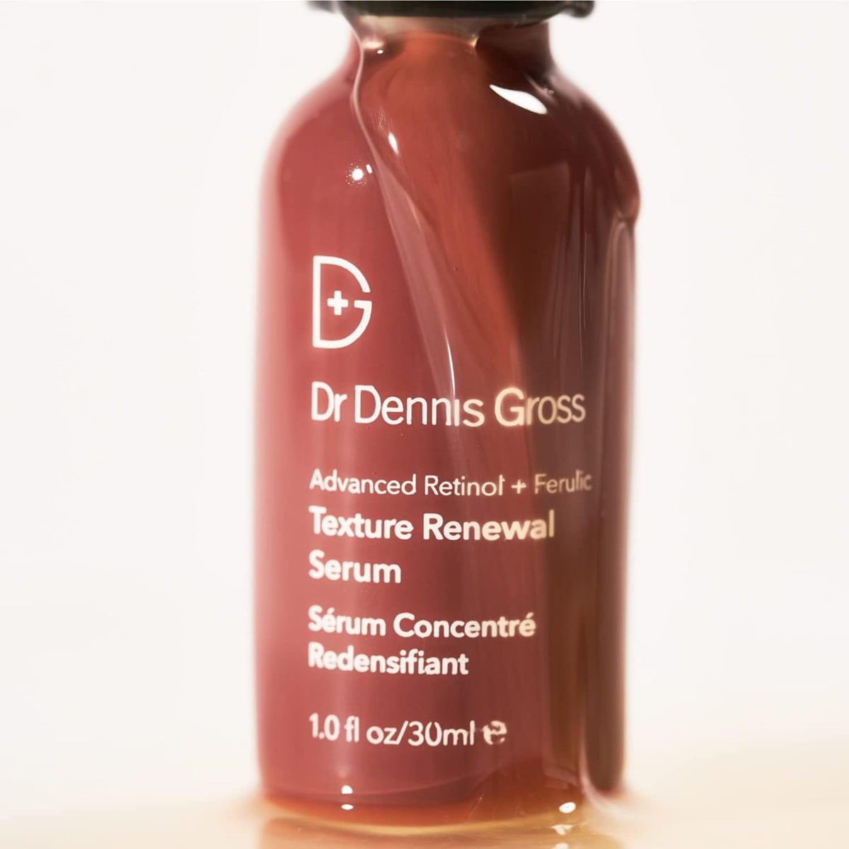 Dr. Dennis Gross size comparison displaying 1 oz bottle scale for travel-friendly benefit