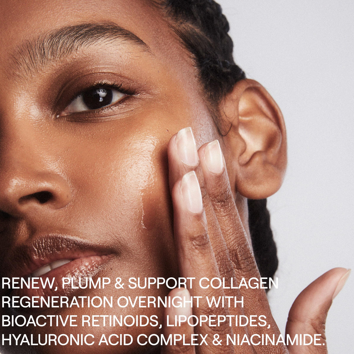 Hand applying Dr. Diamond's Metacine emulsion showing smooth spread and hydration