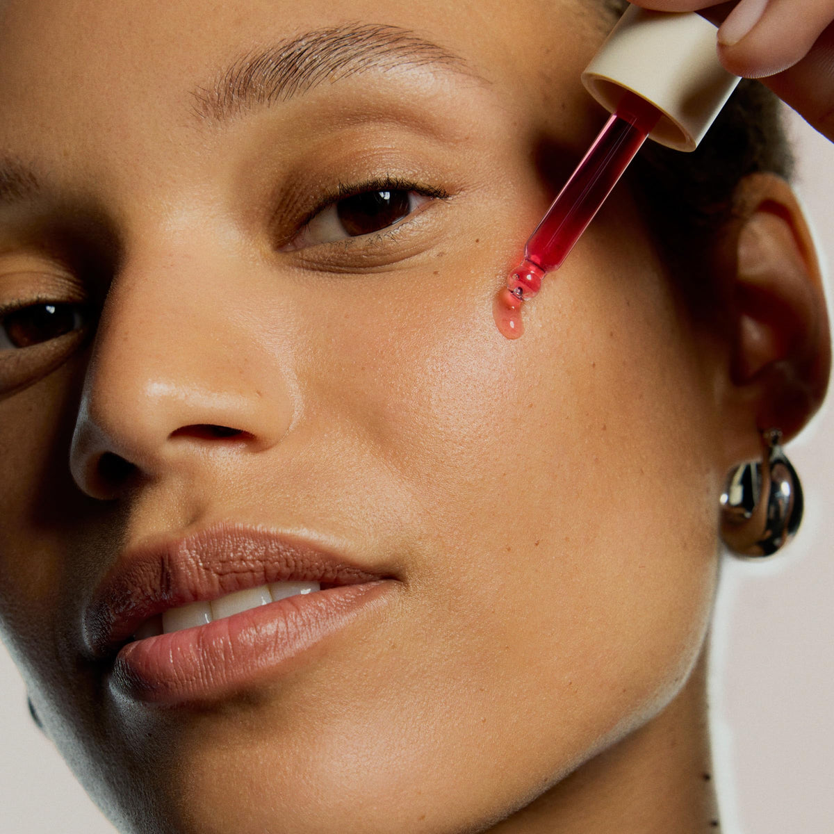 Dr. Diamond's Metacine infusion serum texture close-up showing lightweight gel