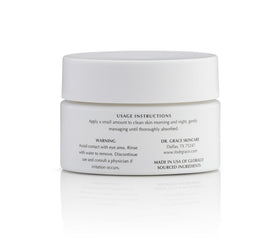Dr. Grace cream texture in spoon showing lightweight smoothness and absorbency