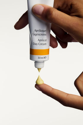 Dr. Hauschka apricot ingredient display showing natural source of vitamins benefit