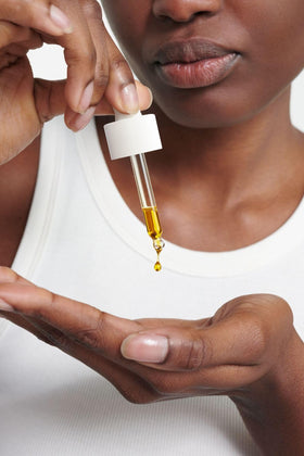 Dr. Hauschka oil on vanity indicating morning routine readiness