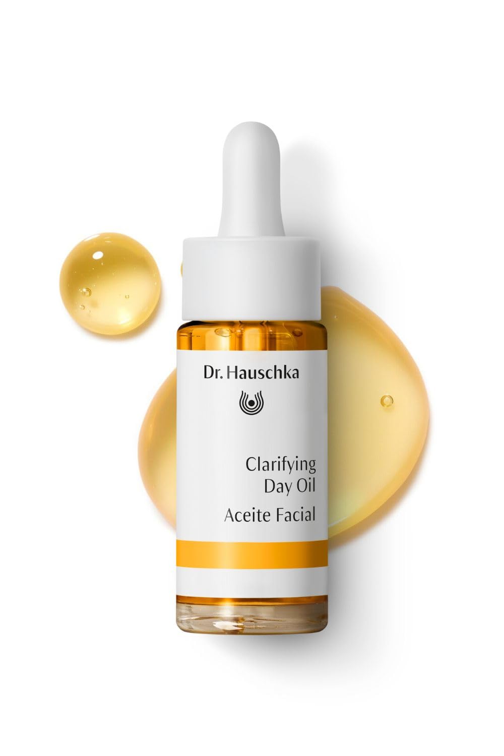 Dr. Hauschka dropper dispensing a drop demonstrating precise application