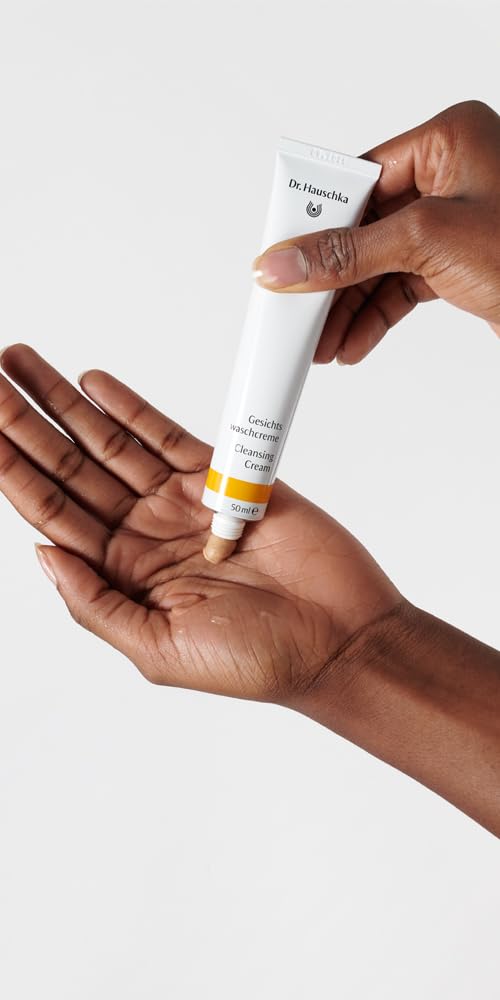 Dr. Hauschka cream lathered in hand demonstrating gentle cleanse and comfortable skin