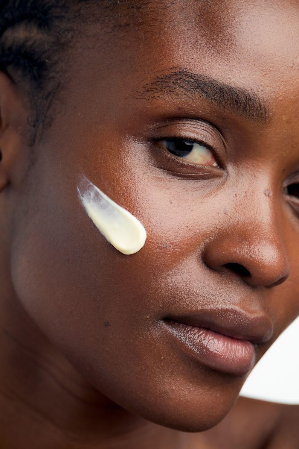 Dr. Hauschka jar on vanity showing daily routine and soothing benefit