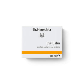 Dr. Hauschka eye balm in use on fingertip demonstrating gentle application benefit
