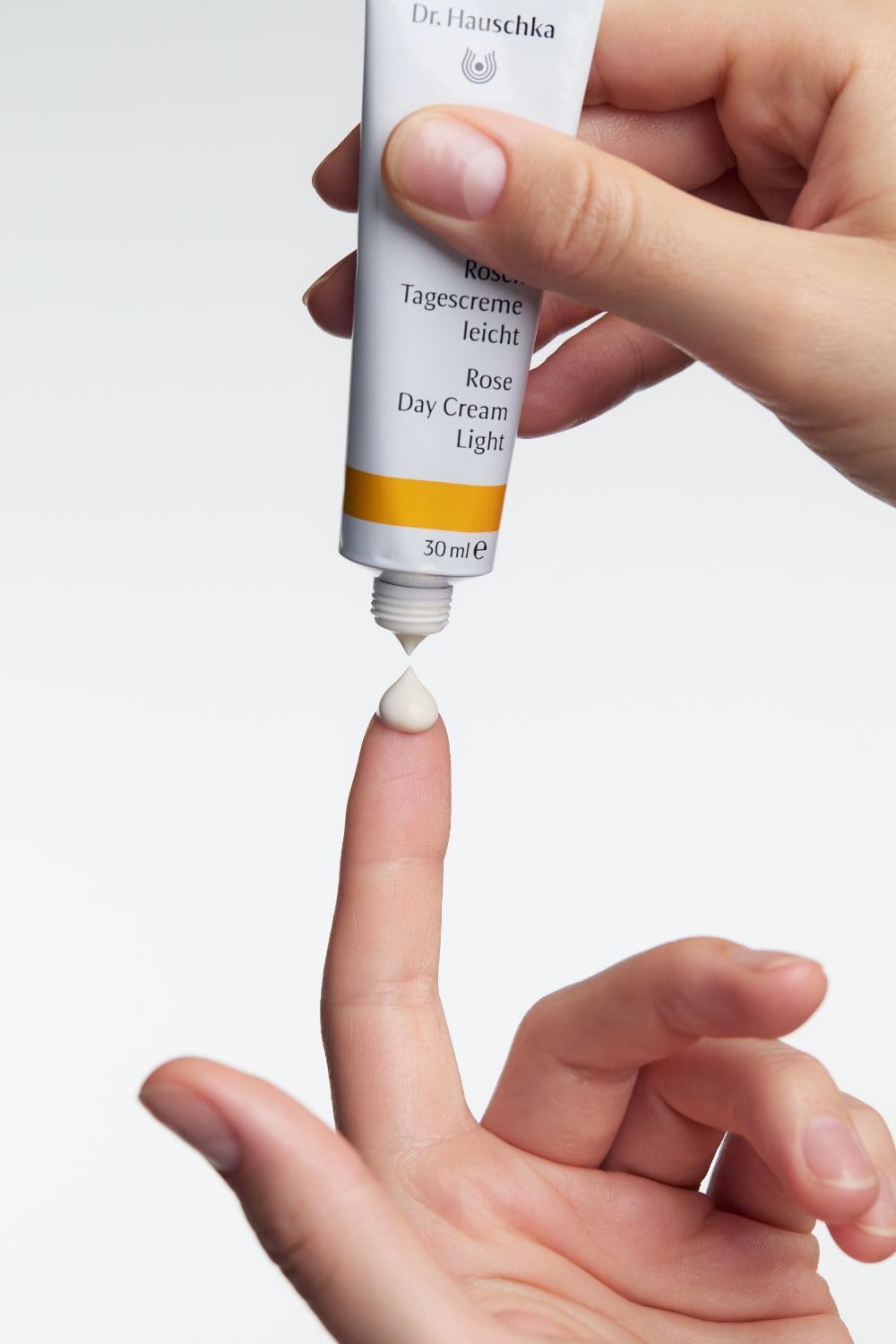 Dr. Hauschka jar on bathroom shelf in lifestyle setting for everyday routine