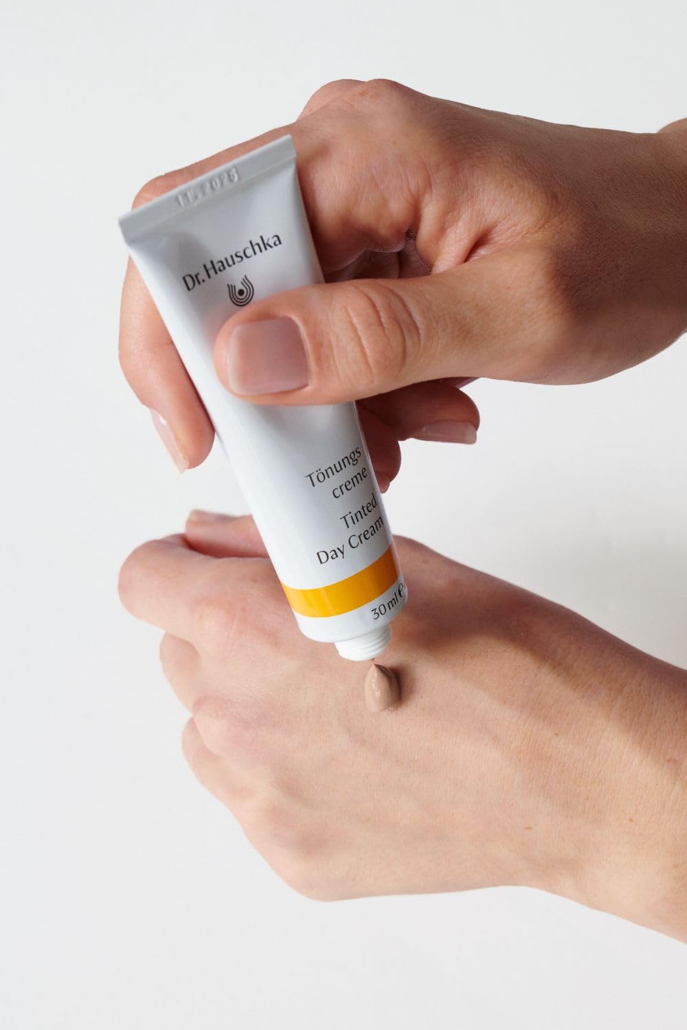 Dr. Hauschka jar and cap detail highlighting quality finish and easy dispensing