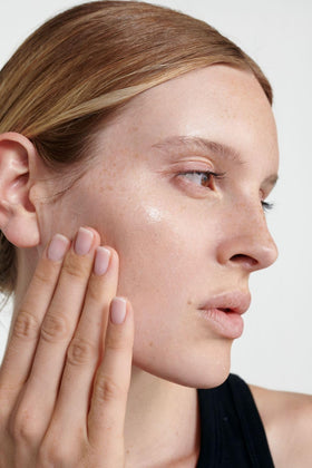 Dr. Hauschka on bathroom shelf styled to show everyday skincare convenience