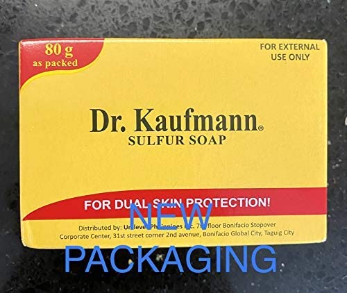 Dr. Kaufmann bar next to hand for size comparison illustrating compact travel-ready bar