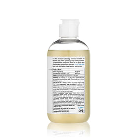 DR. LIFT bottle held in hand for size comparison emphasizing travel-ready 8 oz convenience