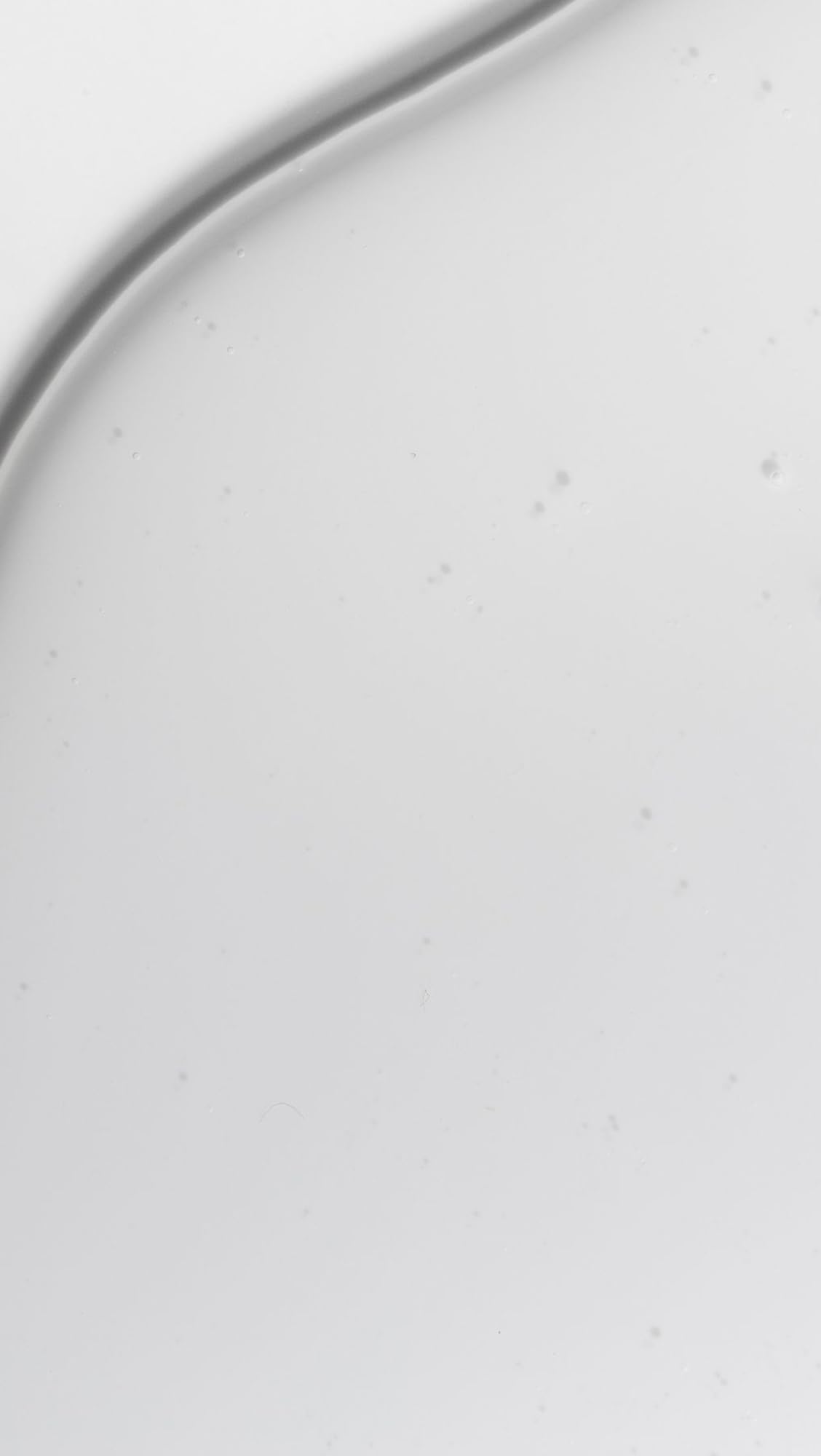 Dr. Loretta pump dispensing cleanser for easy controlled application and minimal waste