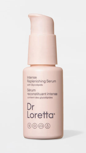 Dr. Loretta serum dropper releasing clear texture to show hydration and absorbency benefit