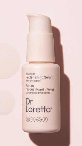 Dr. Loretta serum on a bathroom vanity, styled to show daily-routine convenience and elegance