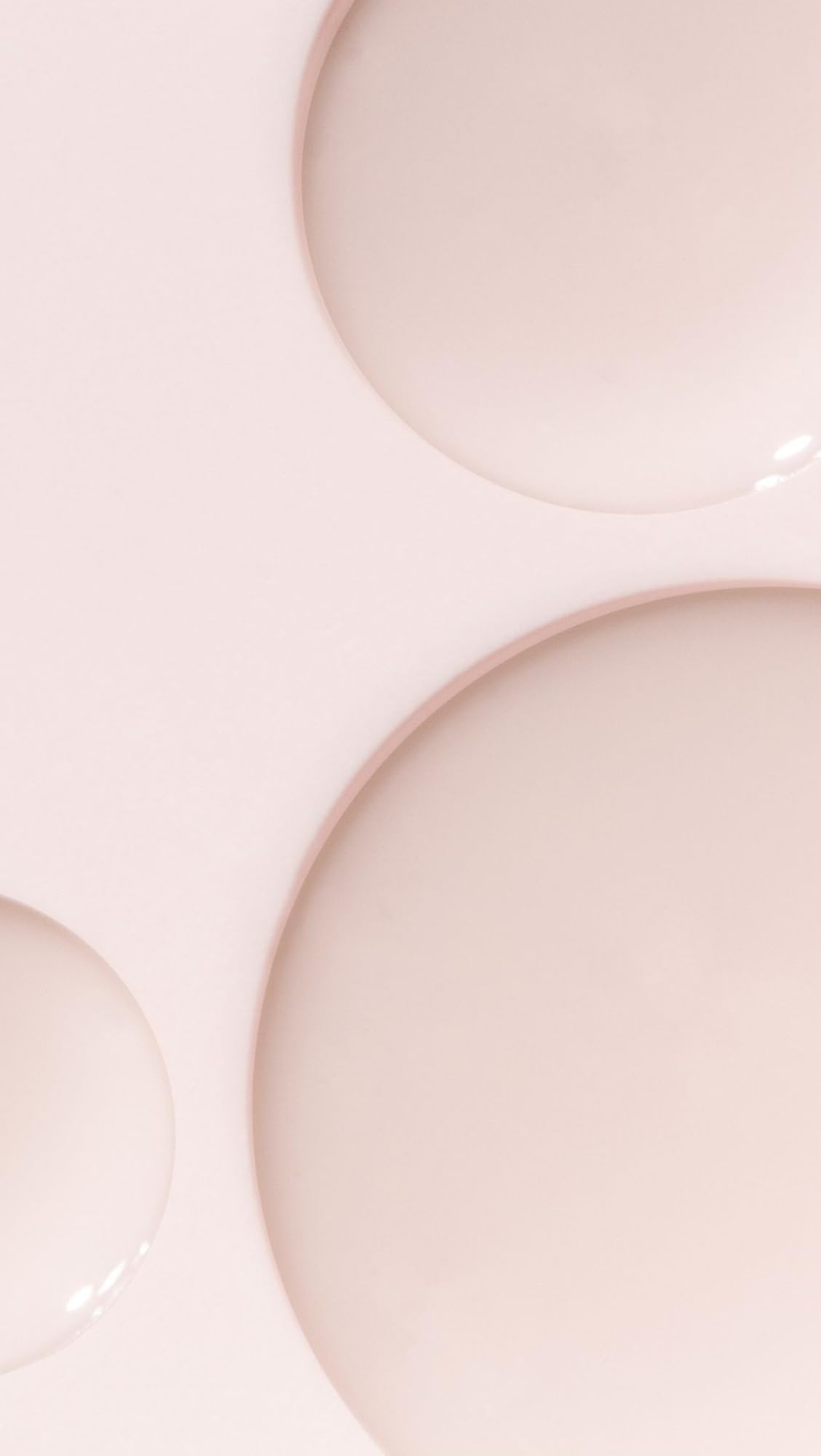 Dr. Loretta serum being applied to cheek, demonstrating lightweight layering and absorbency benefit