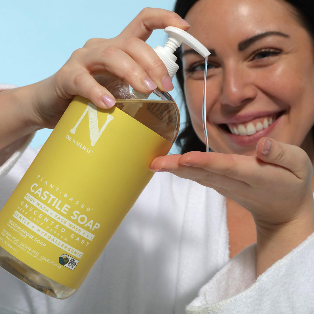 Dr. Natural soap bottle in bathroom shower highlighting everyday use