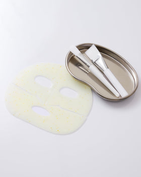 Dr.nineteen mask beside ampoule illustrating full-ampoule essence delivery
