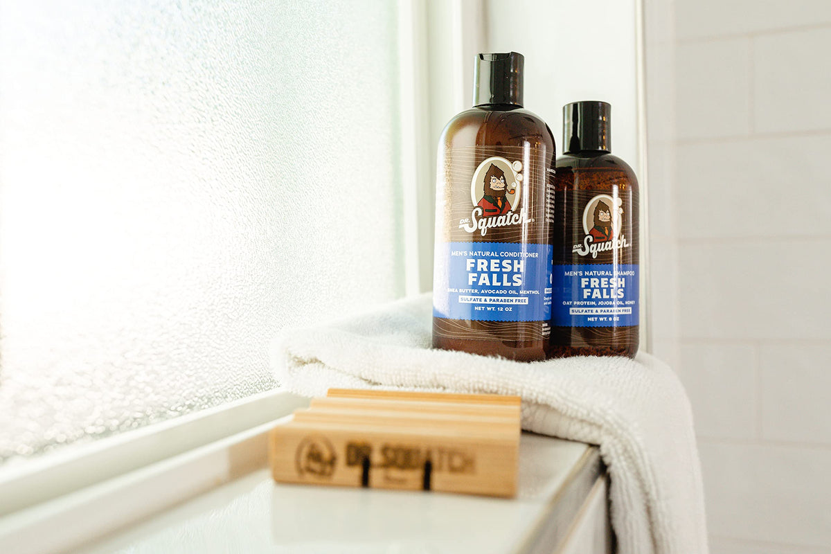 Dr. Squatch ingredient flatlay with jojoba, shea, oat, avocado showing nourishing benefits