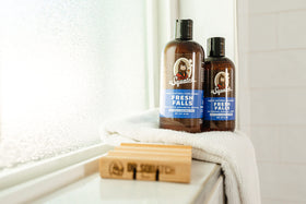 Dr. Squatch ingredient flatlay with jojoba, shea, oat, avocado showing nourishing benefits