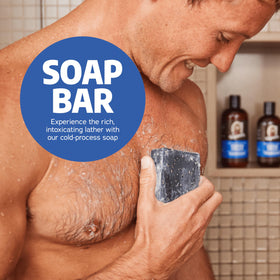 Dr. Squatch bar beside hand for size comparison and easy-handle benefit