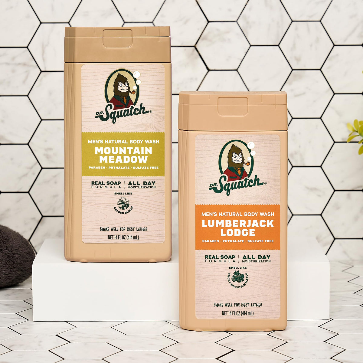 Dr. Squatch bottle held in hand illustrating 14 oz size and lasting supply