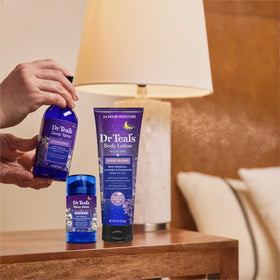 Dr Teal's lotion on bathroom counter with towel indicating bedtime routine enhancement