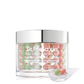 Dr.Melaxin front packaging showing product name and benefits for visible pores